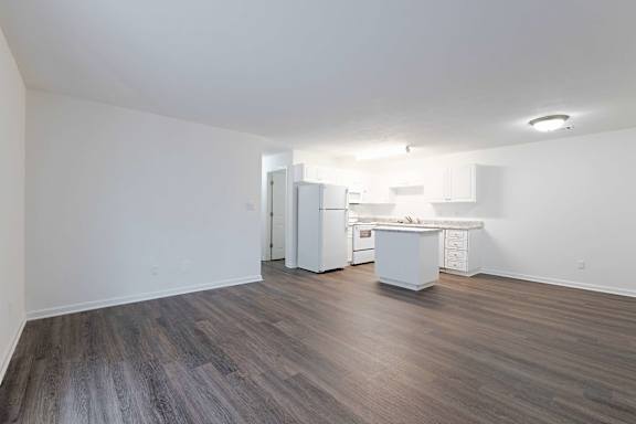 Room with kitchen attached at Sanctuary Apartments and Townhomes, Augusta Georgia