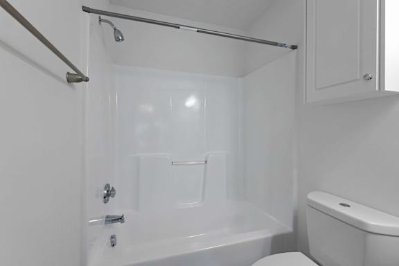 Serene peaceful bathroom with white toilet at Sanctuary Apartments and Townhomes, Augusta, GA 30909