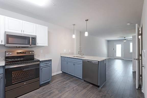 Brown stove in a kitchen at Sanctuary Apartments and Townhomes, Augusta, GA 30909
