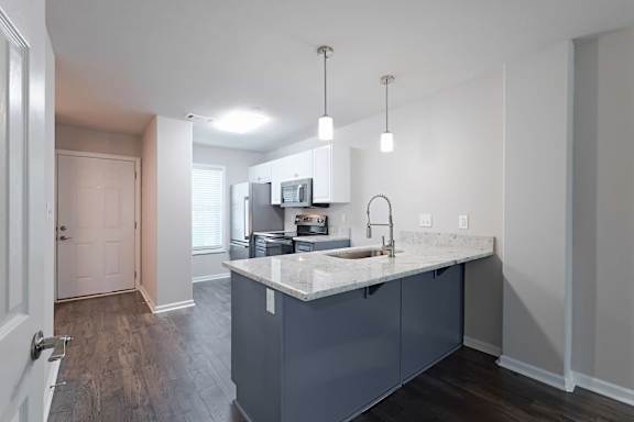 Blue counter and white granite counter at Sanctuary Apartments and Townhomes, Augusta, GA