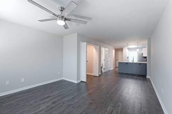 Large living room with wooden floor at Sanctuary Apartments and Townhomes, Augusta, GA 30909