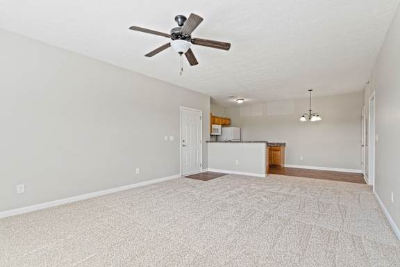 Calm grey interior with window and rug at The Vista Apartments &amp; Townhomes, Warrenville