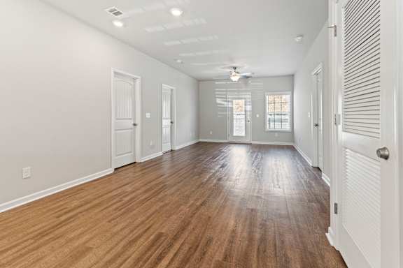 Empty whit room with wooden floor at The Vista Apartments &amp; Townhomes, South Carolina