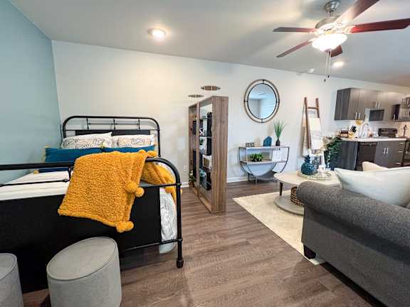 Bedroom, living and kitchen area in studio apartment at The Vista Apartments &amp; Townhomes, Warrenville, South Carolina
