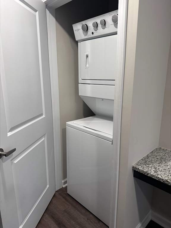 A white oven and dishwasher in a small kitchen.