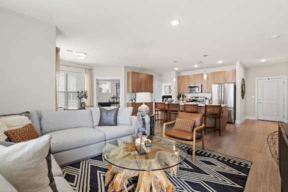a living room with a couch and a table