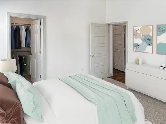Made bed and clothes in closet