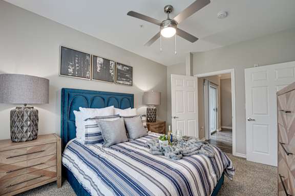 Bedroom with Ceiling Fan at Highland Luxury Living Apartments in TX