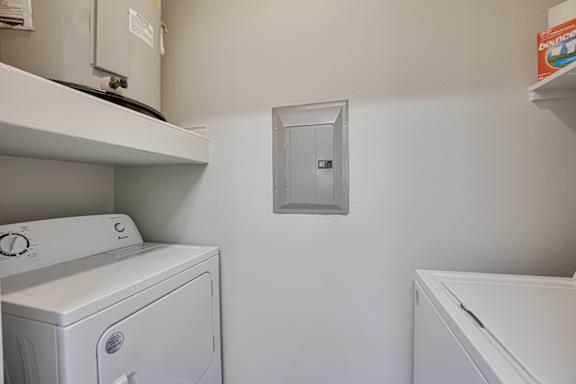 Laundry Room at Highland Luxury Living Apartments in Lewisville