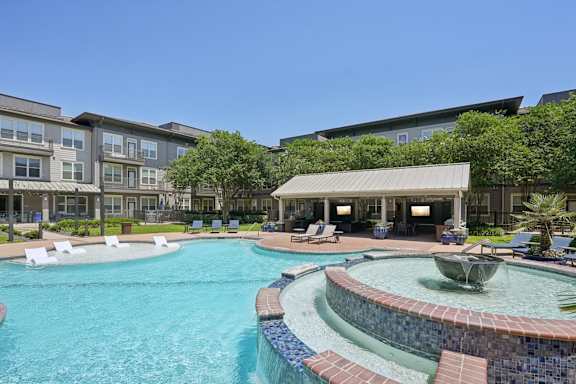 Resort style pool with spa and tanning ledge at Highline Urban Lofts Apartments, Texas, 77429