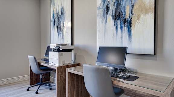 A modern office with a desk, chair, and computer at Highland Luxury Living, Lewisville, TX, 75067