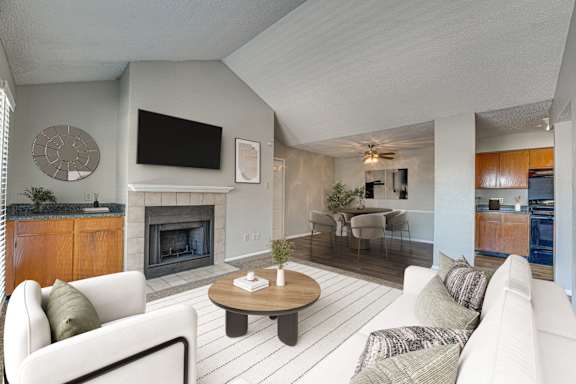 Living Room with a Fireplace at Bardin Oaks Apartments, Arlington, Texas