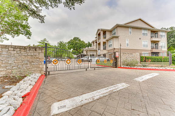 Gated Entrance at The Brazos Apartments, Dallas, TX, 75287