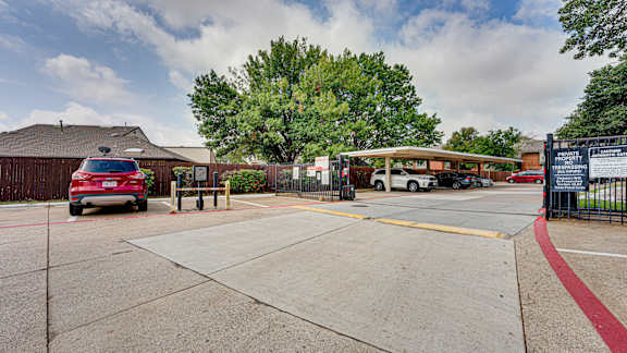 Parking lot at Hunters Hill Apartments, Dallas, Texas
