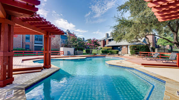 resort style swimming pool at  Indian Creek Apartments in Carrollton, TX
