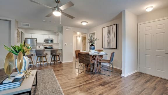 Living room and kitchen at Knox Allen Station Apartments in Allen, TX