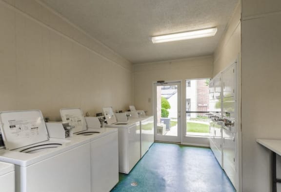 Clothes Care Facility with Washers and Dryers at Wilson Crossing Apartments in Cedar Hill, Texas