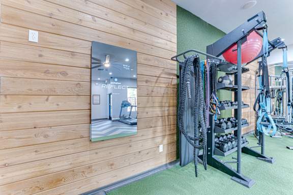 Fitness equipment storage rack with training accessories at Limestone Ranch Apartments, Lewisville