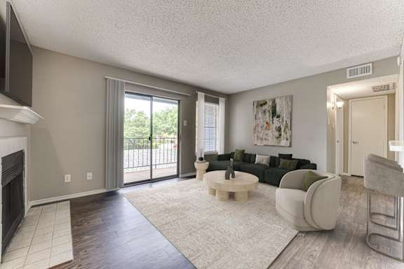 Comfortable Living Room at The Manhattan Apartments, Dallas, 75252