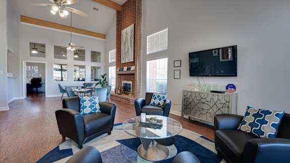 black leather couch in a room at Paces Crossing, Denton