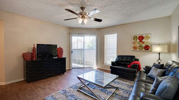 Glass table and couch at Paces Crossing, Denton