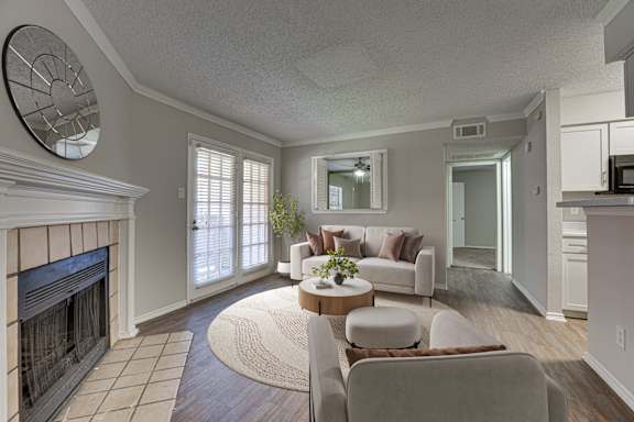 Wall clock in living room at Timberglen Apartments, Texas, 75287