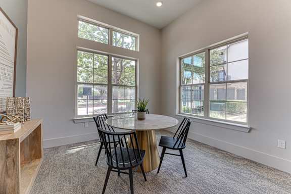 round table and chairs at Vine + Vail Townhomes and Apartments, Grapevine, 76051