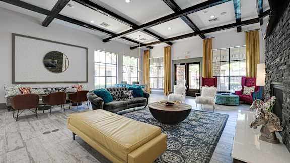 living room with a yellow sofa at Wind Dance, Carrollton Texas