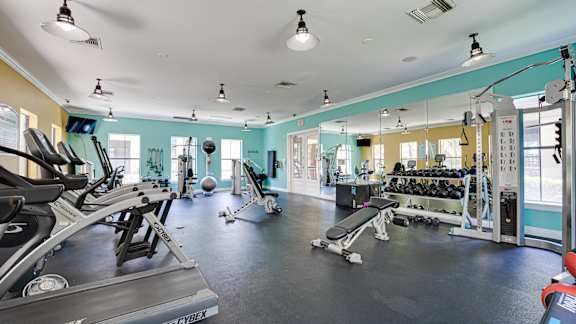 gym with a variety of machines at Wind Dance, Carrollton, 75010
