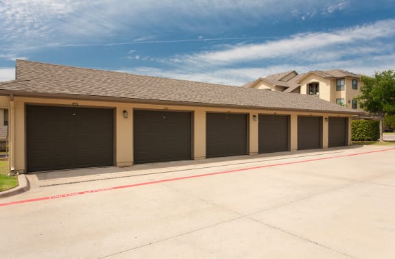 row of garage doors at Wind Dance, Texas, 75010