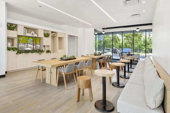 a living room with tables and chairs and a couch
