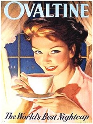 a woman holding a cup of coffee in her hand