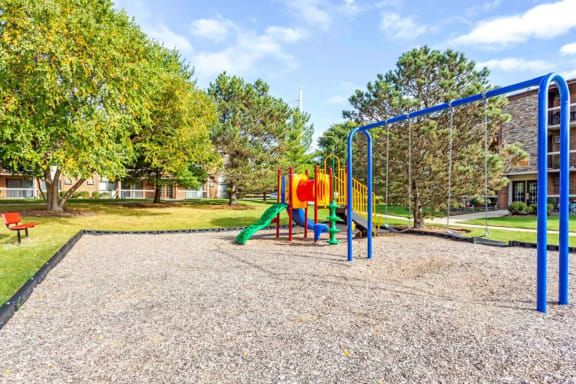 a playground at the residences at omni louisville apartments