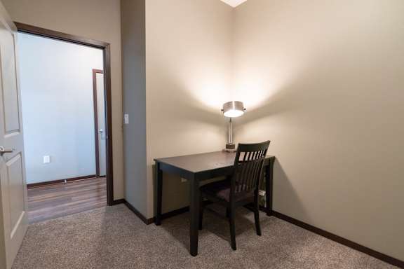 Room with desk, chair and lamp at 360 at Jordan West in West Des Moines, IA