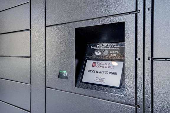 a touch screen kiosk for the package lockers