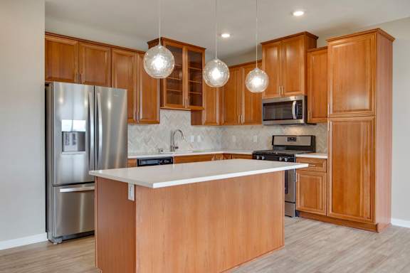 Kitchen with large island and premium stainless steel appliances