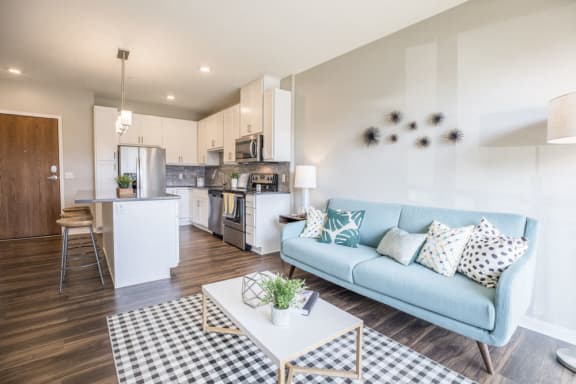 Alpine design scheme with white cabinetry and granite counters at Ascend at Woodbury MN 55129 new luxury apartments