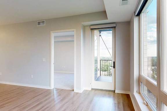 A room with a door and a window.