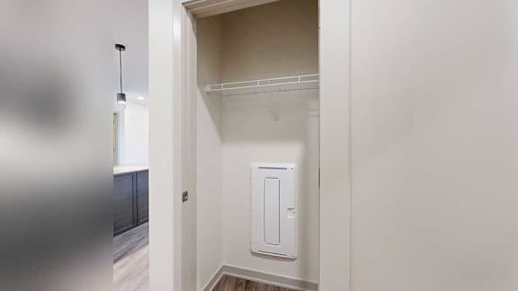 a coat closet in the front entry hallway