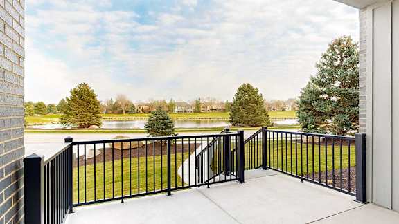the view from the walk-out patio of the pond to the east