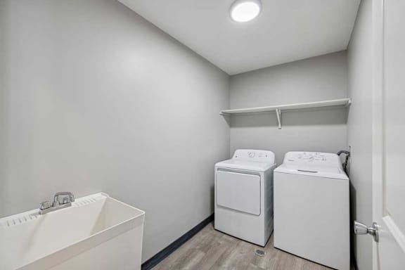 A laundry room with a washer and dryer.
