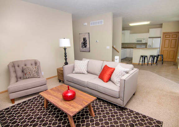 a living room with a couch and a table