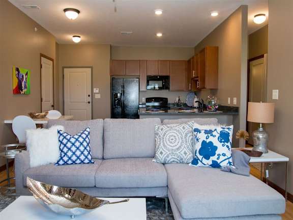 Living room with open floorplan at The Flats at 84 in southeast Lincoln NE 68516
