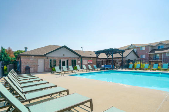 the back of the Highland View Apartments clubhouse that leads to the pool deck