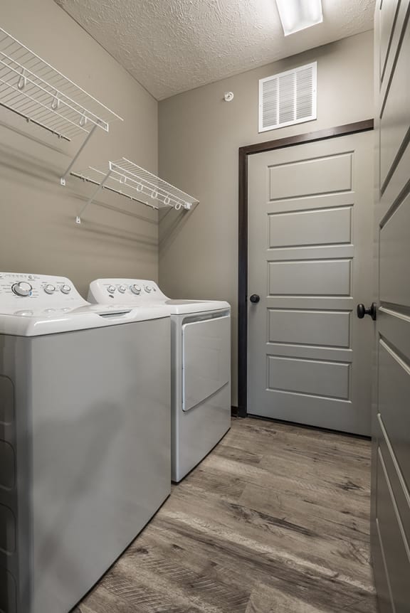 Full sized washer and dryer and laundry room in unit  at North Pointe Villas