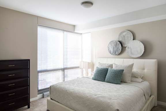 Well decorated bedroom with plenty of natural lights