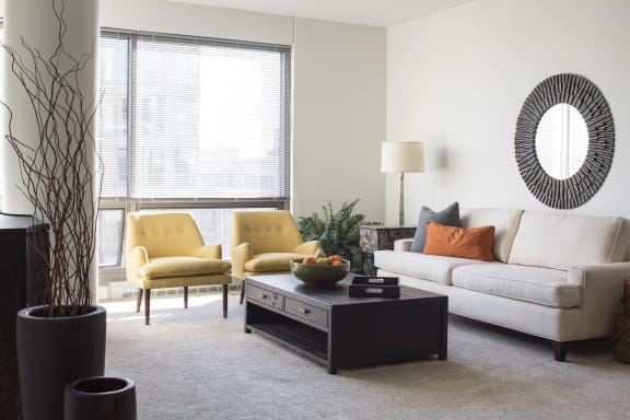 Furnished living room with huge floor to ceiling windows