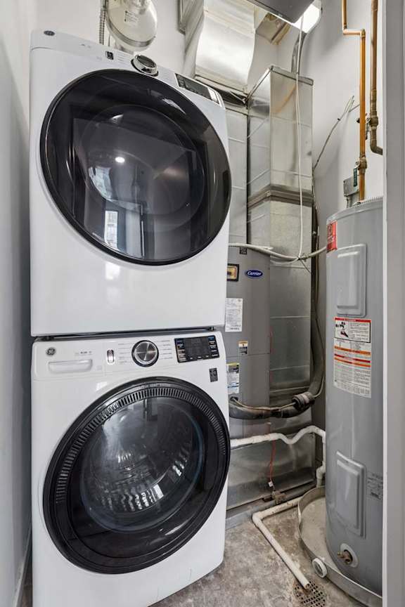 A front load washing machine is installed in a wall.