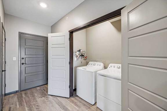 A laundry room with a washer and dryer.