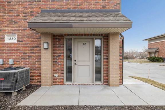 A brick villa apartment entrance